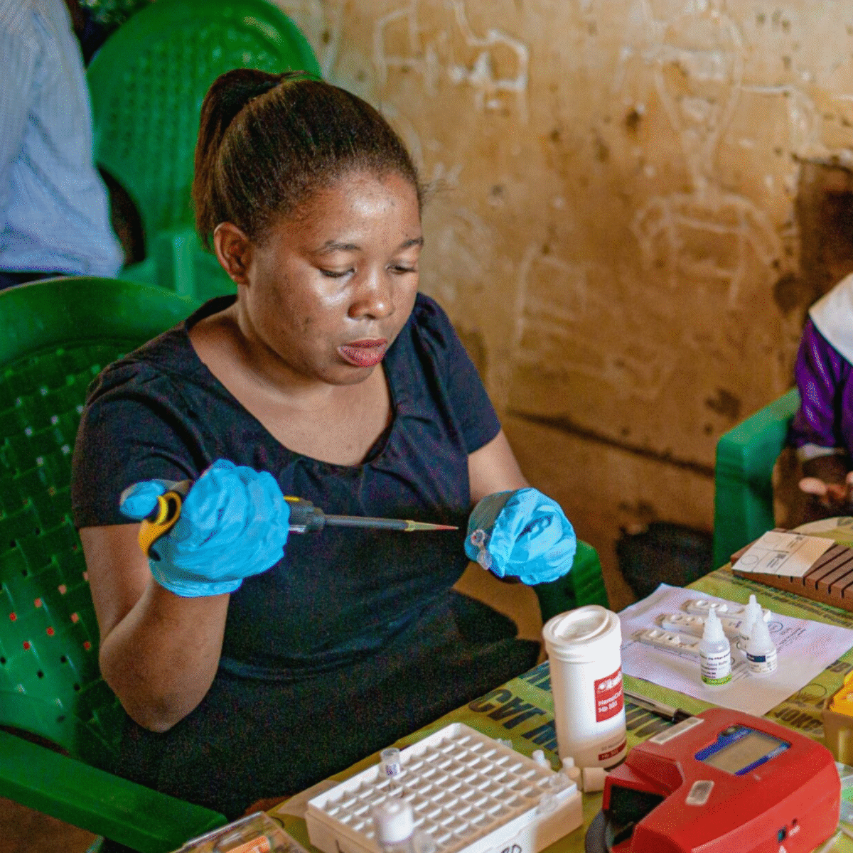 Woman holding a syringe